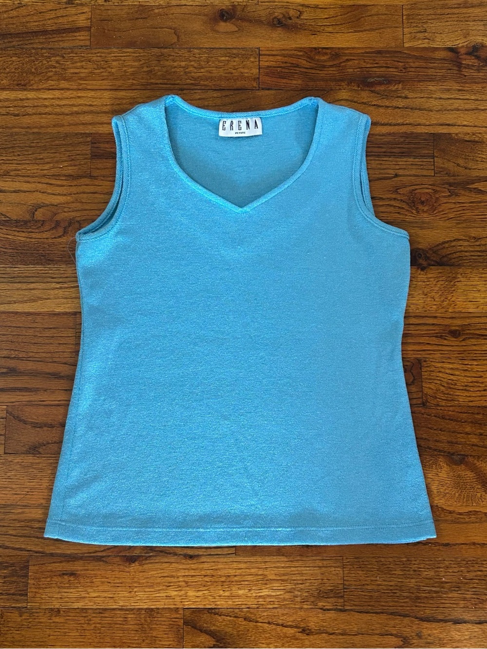 Erena Aqua Blue Tank Top V-neck Blouse
Ladies Medium 8 - 10
Pit to Pit 18”
Leng